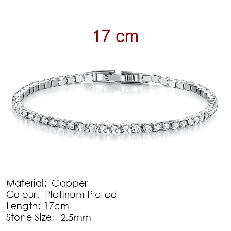 Silver tennis bracelet laid flat on a white background, labeled 17cm length, Material: Copper, Colour: Platinum Plated, Stone Size: 2.5mm.