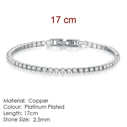 Silver tennis bracelet laid flat on a white background, labeled 17cm length, Material: Copper, Colour: Platinum Plated, Stone Size: 2.5mm.