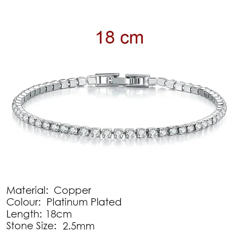 Silver tennis bracelet laid flat on a white background, labeled 18cm length, Material: Copper, Colour: Platinum Plated, Stone Size: 2.5mm.
