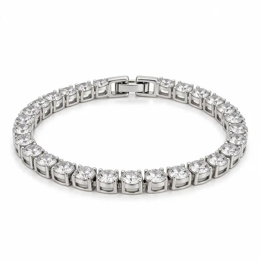 Silver tennis bracelet with round cubic zirconia stones, on a plain white background.