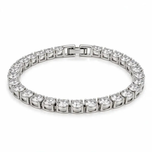 Silver tennis bracelet with round cubic zirconia stones, on a plain white background.