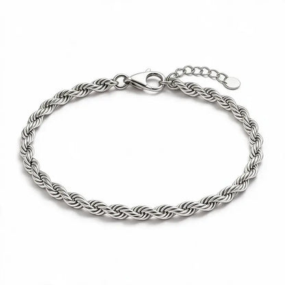 Silver twisted rope chain bracelet with a lobster clasp, round tag charm, and an adjustable extension chain, on a plain white background