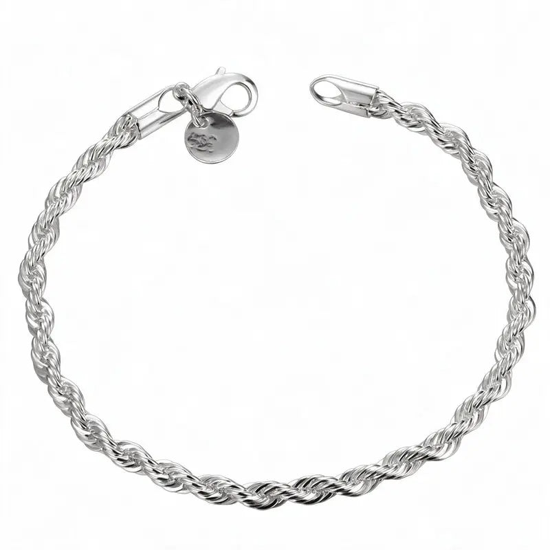 Silver twisted rope chain bracelet with a lobster clasp and round tag charm, on a plain white background.