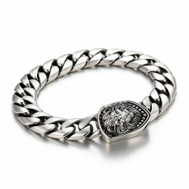 Regal Lion Cuban Bracelet, silver Cuban chain with lion-head clasp, white background
