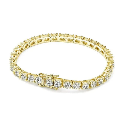 Gold-tone tennis bracelet with moissanite stones laid flat in an oval on a plain white background.