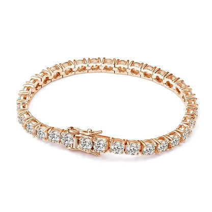 Rose gold-tone tennis bracelet with moissanite stones laid flat in an oval on a plain white background.