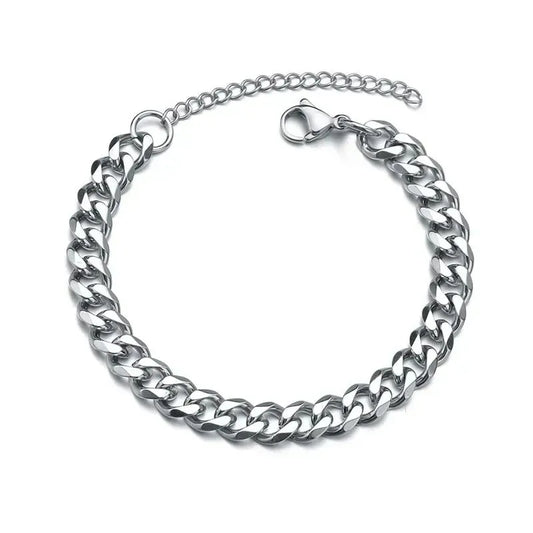 Silver Cuban chain bracelet laid in a circle on a plain white background, with the lobster clasp and extension chain visible.