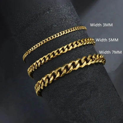 Three gold-tone Cuban chains in 3mm, 5mm, and 7mm widths draped around a black display stand, labeled by width.
