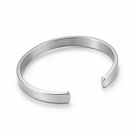 Silver stainless steel open cuff bangle product photo on white background