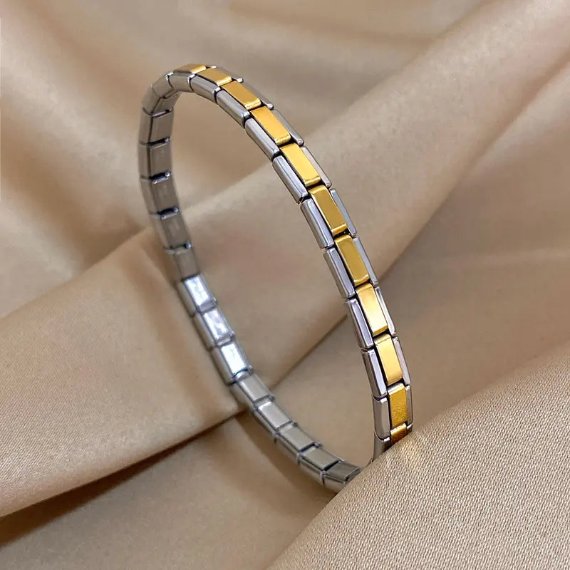 Silver stainless steel Italian link bracelet with gold accent section