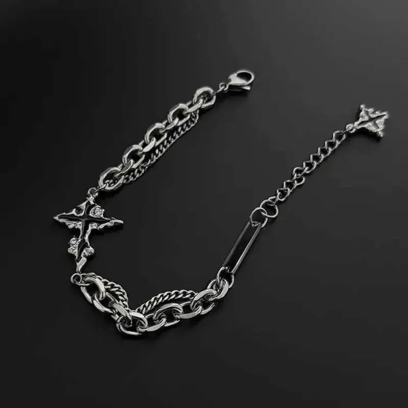 Dark cross bracelet flat lay with adjustable extension chain
