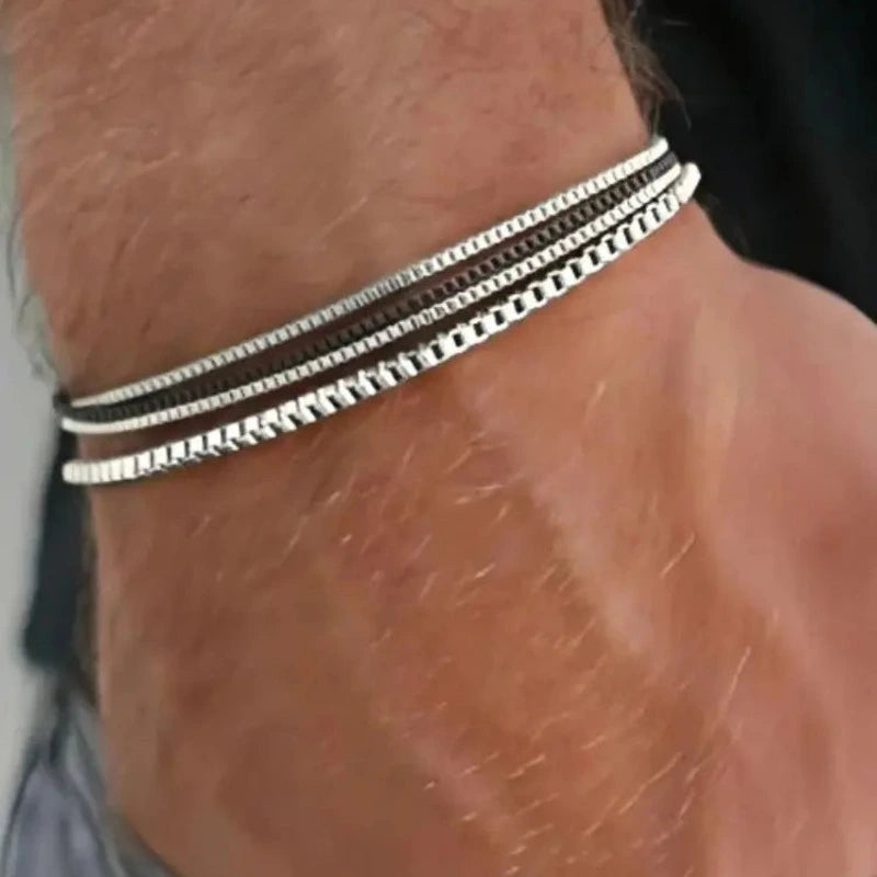 Stainless steel box chain bracelet set worn on wrist with denim